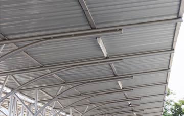 installing Modest Corner metal roofing